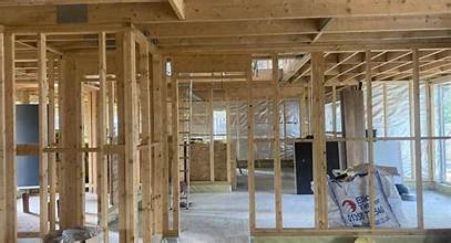 Neat first-fix wiring routes in a period property, clipped and planned around older structure.